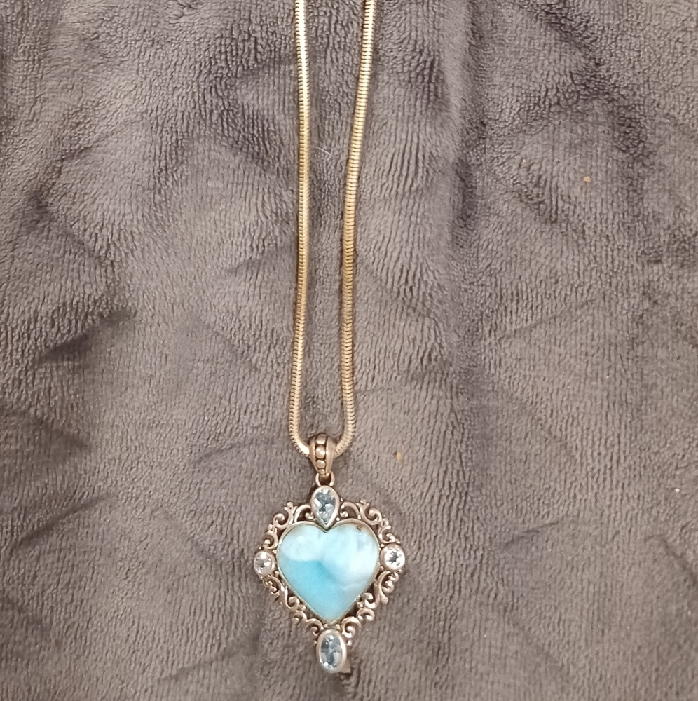 Larimar Heart shaped stone and Sky Blue Topaz pendant with 20 inch snake chain.